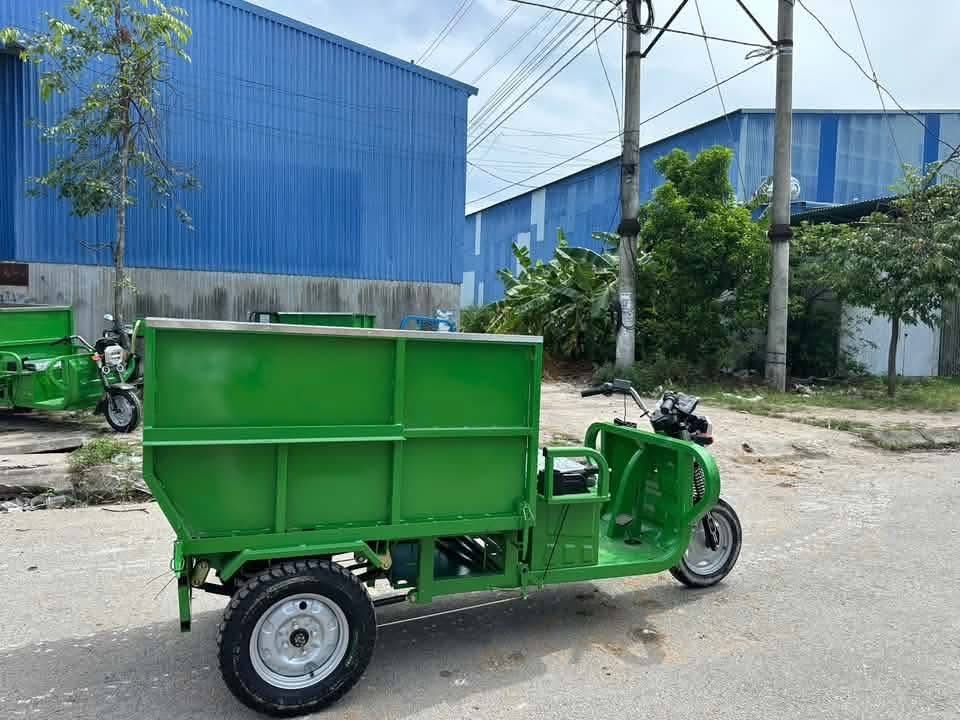 Xe Điện Chở Rác 3 Bánh Môi Trường 1 Tấn Ben Nâng Hạ 4 Xe Điện Chở Rác 3 Bánh Môi Trường 1 Tấn Ben Nâng Hạ - Ảnh 4